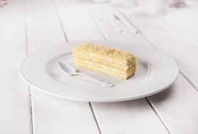 Classic light puff-pastry cake with mild cream layers